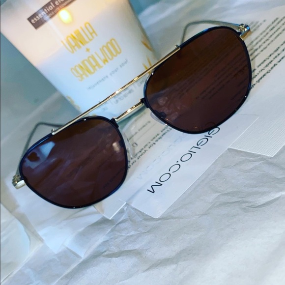 Salvatore ferragamo Sunglasses gold with black rims and brown tinted lenses - Picture 1 of 16